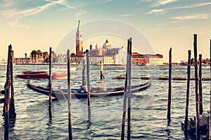 Gondola ride in Venice, Italy at sunset.