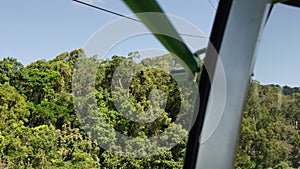 Gondola service that arrives in Kuranda and passes over pristine tropical jungles north of Cairns. Australia. Shot on