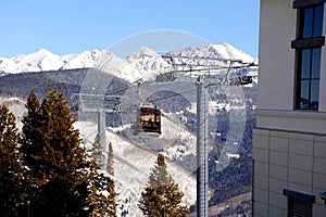 The gondola ski lift taking skiers up the mountain in Vail, Colorado.
