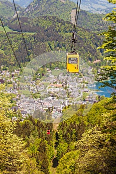 Gondola of Zwoelferhorn Seilbahn cable way and a view of alpin