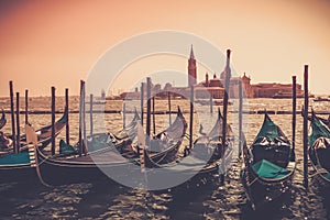 Gondolas against Venice panorama