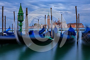 Gondolas along Grand Canal at St Marco square with San Giorgio M