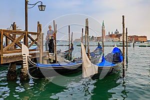 Gondolas along Grand Canal at St Marco square with San Giorgio M