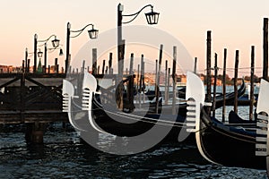 Gondolas berthed on the Venetian lagoon