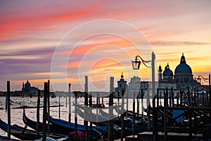 Gondolas on Grand canal at sunset in Venice, Italy