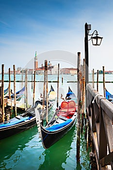 Gondolas on the Grand canal at sunset in Venice, Italy