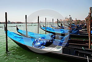 Gondolas moored by Saint Mark square. Venice, Italy