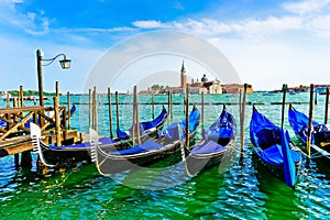 Gondolas moored in Venice.