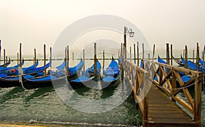 Gondolas on the pier of San Marco