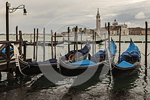 Gondolas ride on the canals of venice