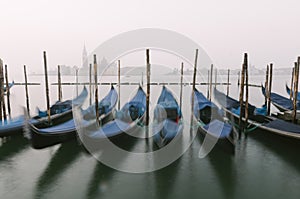 Gondolas at their moorings in Venice, Veneto, Italy, Europe