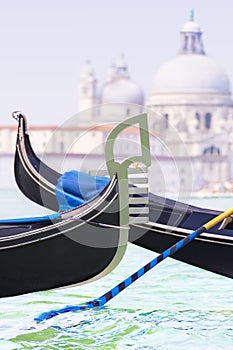 A gondolas tour on Grand Canal against Basilica di Santa Maria della Salute background, Venice, Italy,vertical cityscape. Iron