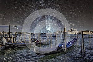 Gondolas in Venice, Italy at night