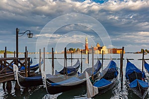 Gondolas in Venice lagoon after the storm, Italia photo