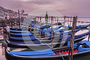 Gondolas in Venice at sunrise