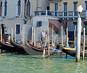 Gondolier on the grand canal, Venice Italy