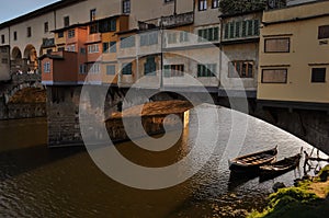 Gondolier on river Arno below Ponte Vecchio Florence