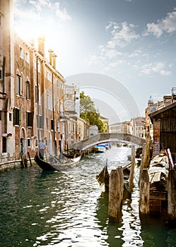 Gondolier showing tourists Venice city, Italy