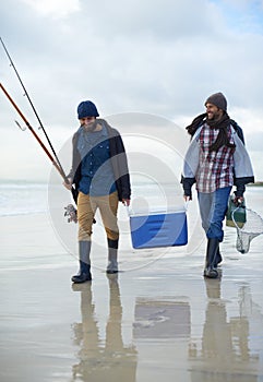 gone fishin. a two friends fishing on an early overcast morning.