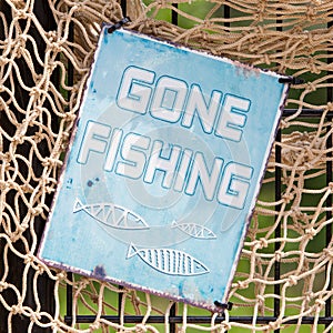 Gone fishing sign