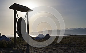 Gong meditation tai chi chuan at sunset on the beach