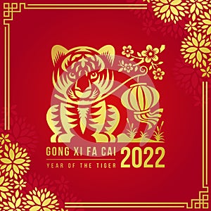 Gong xi fa cai, year of the tiger - chinese new year 2022, gold tiger zodiac siting and holding a lantern with mouth sign in