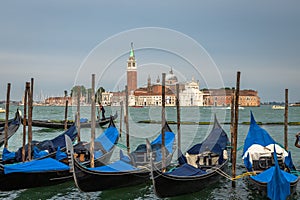 Gongolas and Abbazia in Venice