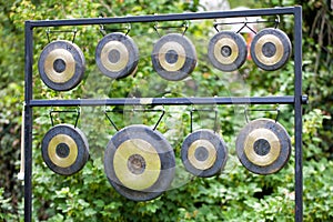 Gongs in a frame