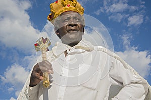 GonÃÂ§alves, Minas Gerais, Brazil - March 19, 2016: Afro-Brazilian man in costume, celebrating the Revelry of Kings during carnival