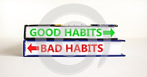Good or bad habits symbol. Concept word Good habits Bad habits on beautiful books. Beautiful white table white background.