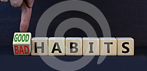 Good or bad habits symbol. Turned wooden cubes and changed concept words Old habits to New habits. Beautiful grey table grey