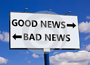 Good or bad news symbol. Concept word Good news Bad news on beautiful billboard with two arrows. Beautiful blue sky with clouds