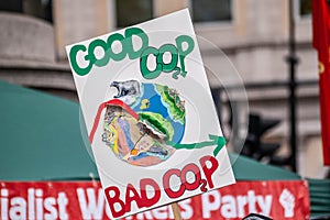 Good cop bad cop climate change placard