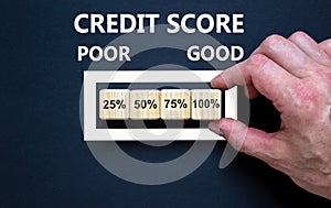 Good credit score symbol. Loading percentages with hand putting wood cube in progress bar. Words credit score, poor, good.