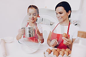 Good Day for Mother and Daughter. Cook Together.