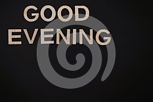 good evening write on black background