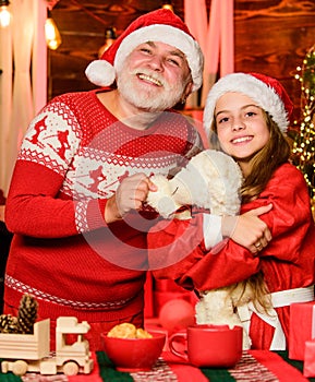 Good family. father and daughter love christmas. grandfather and grandchild at home. happy new year. family holiday