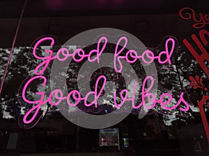 Good food good vibes pink neon sign