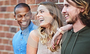 Good friends, good vibes. Shot of a group of friends having fun outdoors over the weekend.