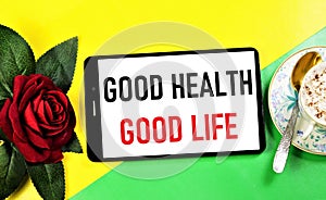 Good health, good life. Text message on the smartphone screen.