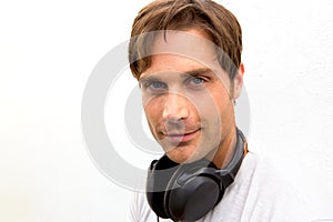 Good looking blond boy with headphones