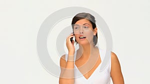 Good looking brunette having a phone call