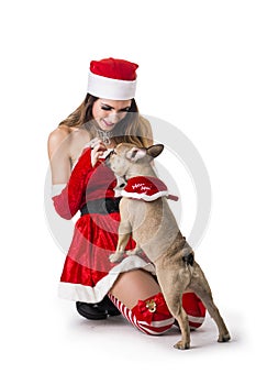 Good looking couple in Santa Claus hat with Christmas gift