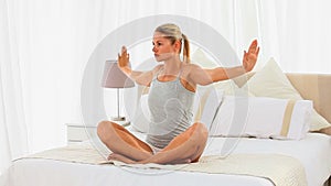 Good looking woman doing yoga