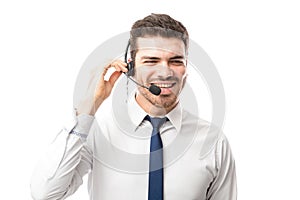 Sales rep smiling over a phone call photo