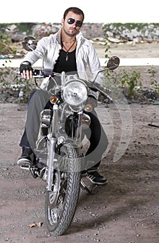 Good looking young man on motorcycle