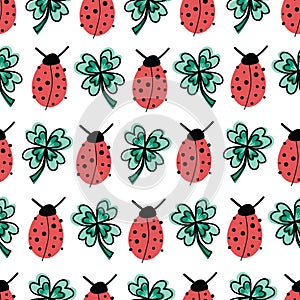 Good luck four-leaf clover and ladybug charms talisman seamless vector pattern. Repeating hand drawn fortune background. Use for
