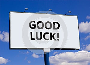 Good luck symbol. Concept words Good luck on beautiful big white billboard. Beautiful blue sky cloud background. Business,