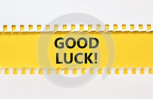 Good luck symbol. Concept words Good luck on beautiful yellow paper. Beautiful white paper background. Business, motivational good