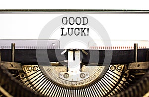 Good luck symbol. Concept words Good luck typed on beautiful old retro typewriter. Beautiful white paper background. Business,